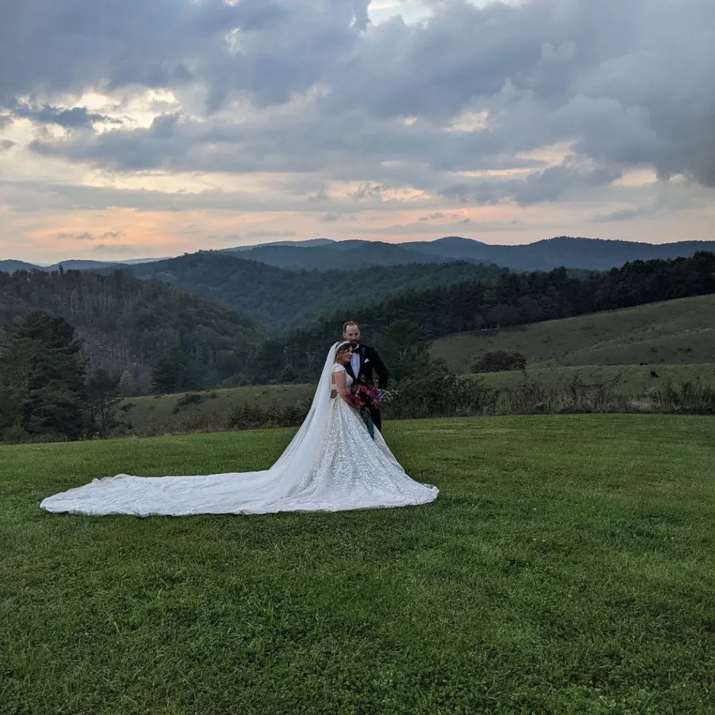 beautiful wedding dress and view of the property